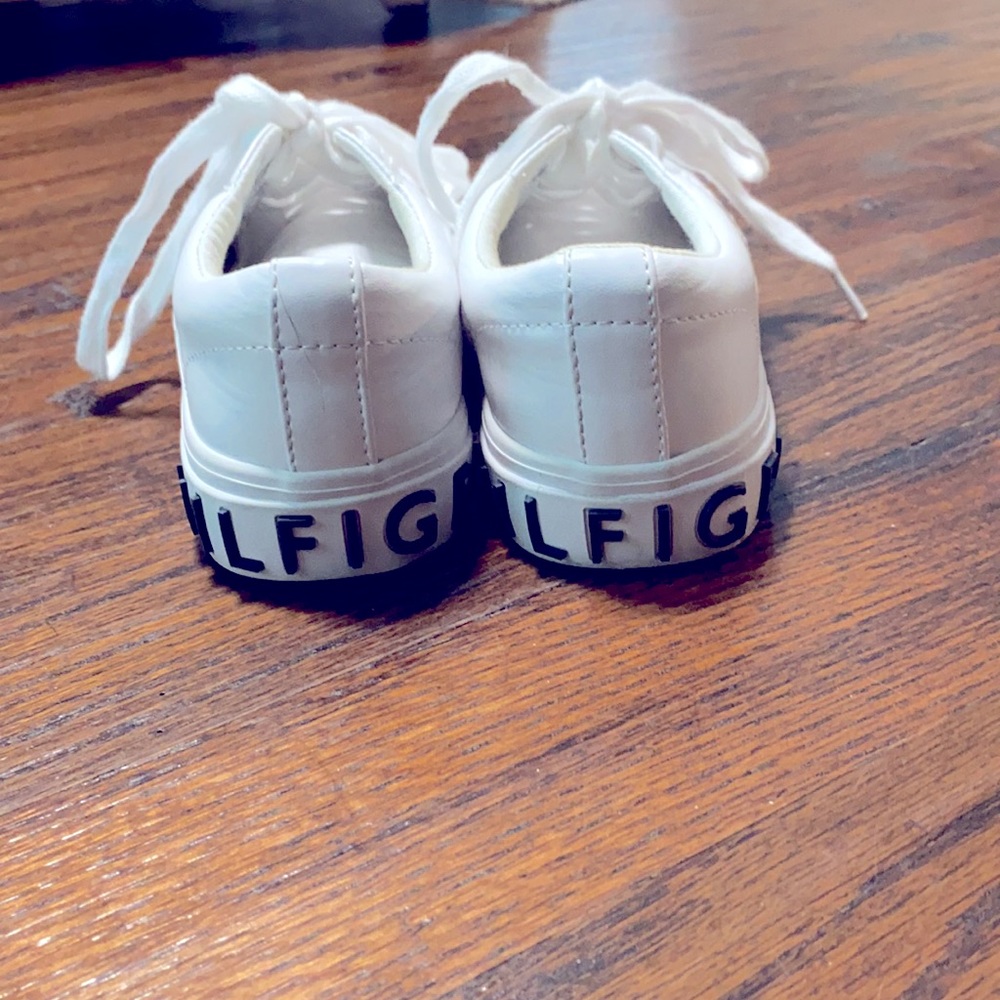 White Tommy Hilfiger athletic shoes.